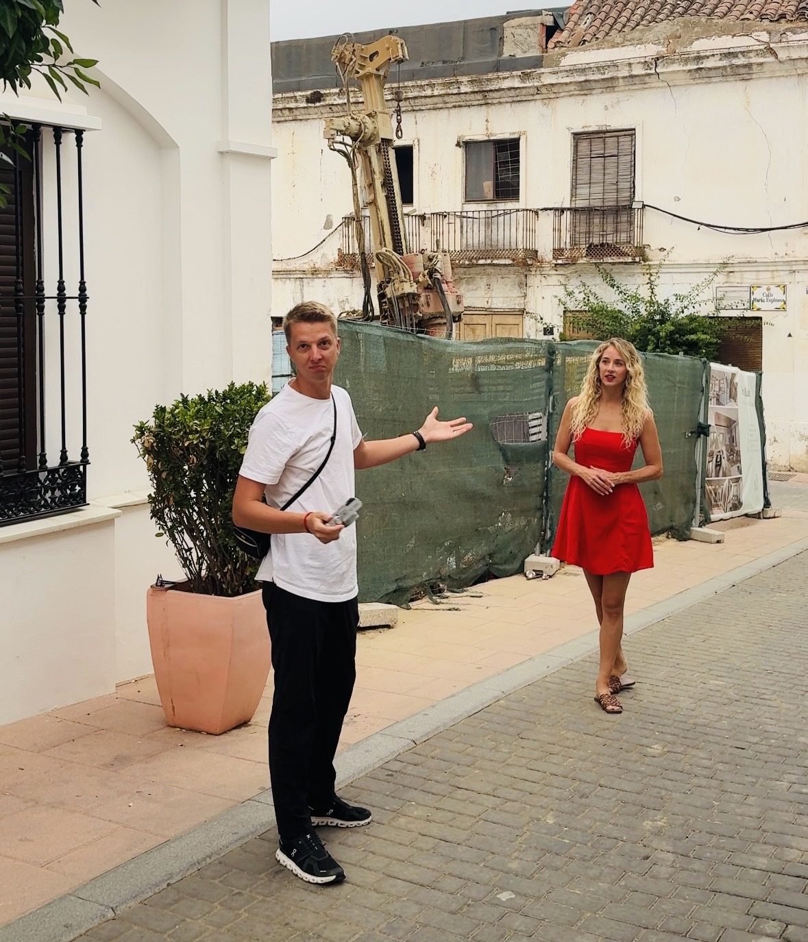 Arthur on a street, camera in hand